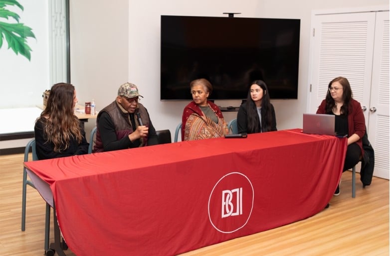 Photograph of the CityFleet Maintenance Facility project partners on a discussion pannel about successful teaming.