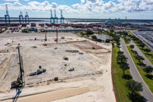 Image of The Before: Early sitework at JAXPORT highlights the complexity of building a large-scale industrial facility within an active, secured port operation.